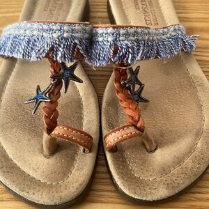 Klimatsakis leather toe thong sandal made in Greece blue fringed starfish charms